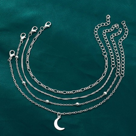 Tobillera con cuatro cadenas plateadas