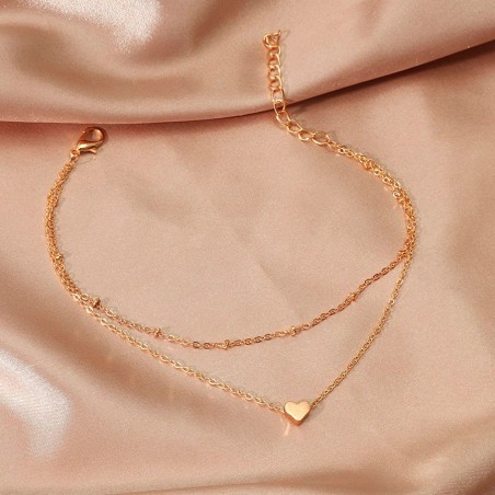 Tobillera doble cadena con corazón dorado